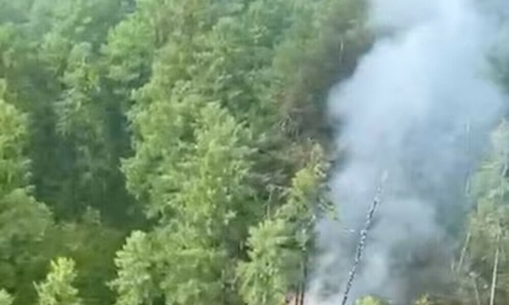 Smoke rises at the crash site of an Angara Airlines An-24 passenger plane near Tynda in the Amur Region, Russia July 24, 2025: Photo: Reuters