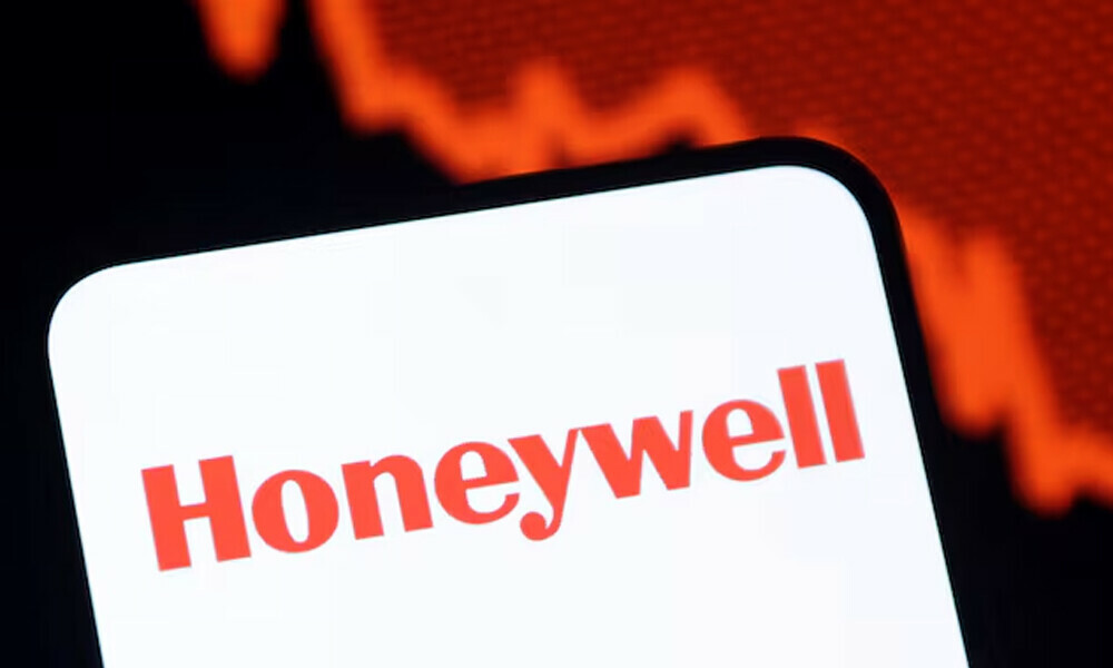 Honeywell logo and a decreasing stock graph are seen in this illustration taken July 26, 2025. REUTERS