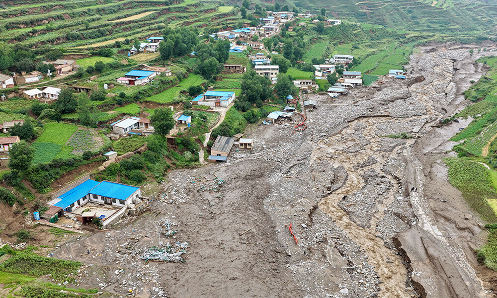 Rescue workers search for survivors after a flash flood in Yuzhong county, in China&rsquo;s northwest Gansu province on August 8, 2025. Photo: AFPflood