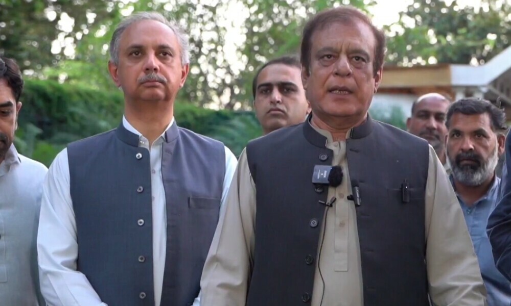 PTI leaders Omar Ayub (left) and Shibli Faraz speaking to media in Islamabad on May 7, 2024. Photo: Screengrab/YouTube/@ImranKhanOfficialChannel