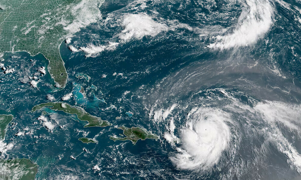 Hurricane Erin, which is the first hurricane of the 2025 Atlantic season and has developed into a dangerous Category 4 hurricane, moves westward near Puerto Rico in a composite satellite image August 16, 2025. Photo: Reuters