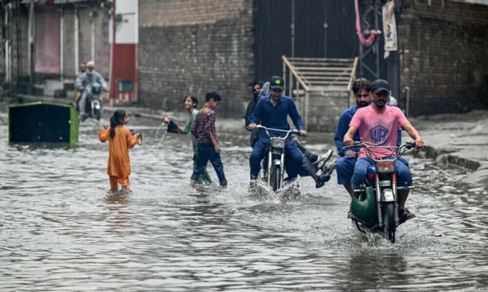 Commuters wade through a flooded street amid heavy monsoon rains in Rawalpindi on July 17, 2025. Photo: AFP Commuters wade through a flooded street amid heavy monsoon rains in Rawalpindi on July 17, 2025. Photo: AFP
