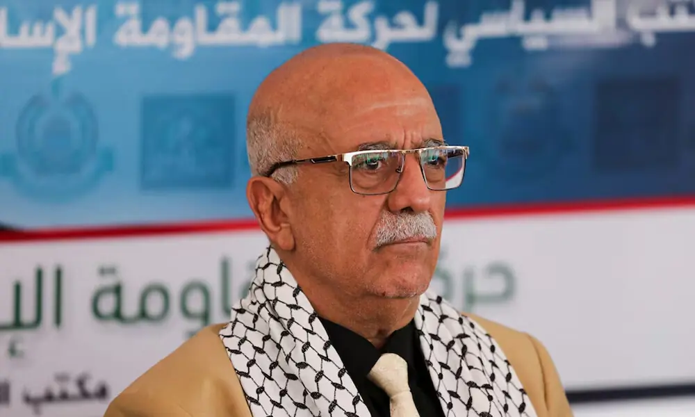 Head of the Houthi-led government Ahmad al-Rahawi looks on during a visit by Houthi government officials to the Hamas office in Sanaa, Yemen August 19, 2024. REUTERS
