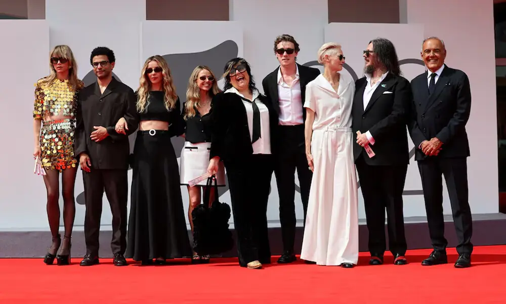 Directors Iain Forsyth and Jane Pollard, Producer Beth Earl, and cast members Tilda Swinton, Calvin Demba, Sophia Di Martino, Suki Waterhouse and George MacKay pose with Venice Film Festival Artistic Director Alberto Barbera on the red carpet for the screening of the movie &ldquo;Broken English&rdquo; out of competition, at the 82nd Venice International Film Festival, in Venice, Italy, August 30, 2025. Photo: Reuters