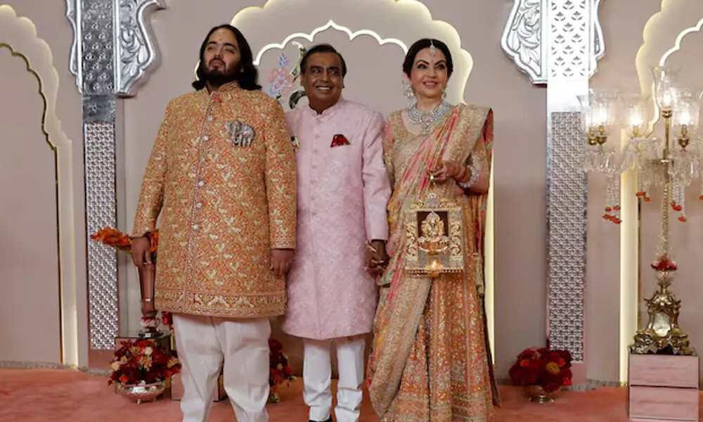 Groom Anant Ambani poses for pictures with Nita Ambani and Mukesh Ambani on the red carpet on the day of his wedding with Radhika Merchant in Mumbai, India, July 12, 2024. File Photo: Groom Anant Ambani poses for pictures with Nita Ambani and Mukesh Ambani on the red carpet on the day of his wedding with Radhika Merchant in Mumbai, India, July 12, 2024. File Photo: