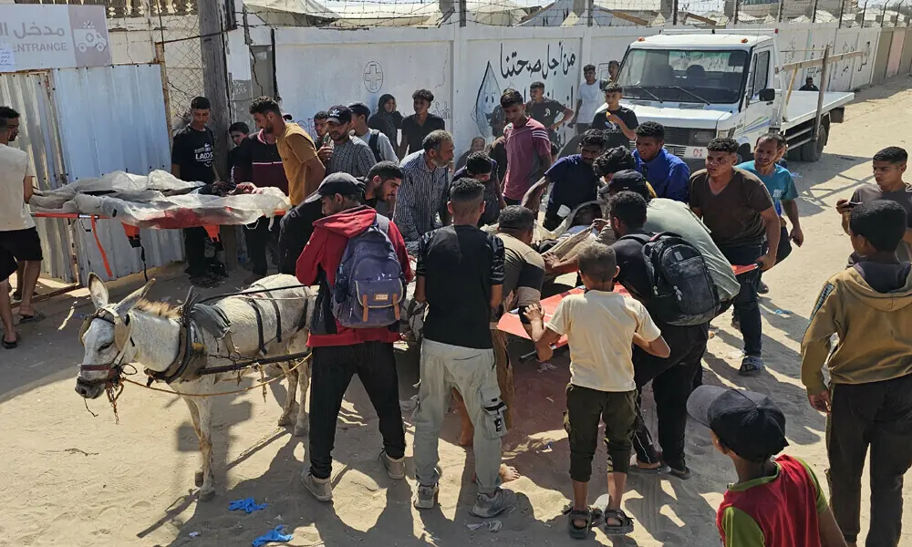 Palestinians transport bodies towards a hospital in Rafah, in the southern Gaza Strip on June 16, 2025. Photo: AFP