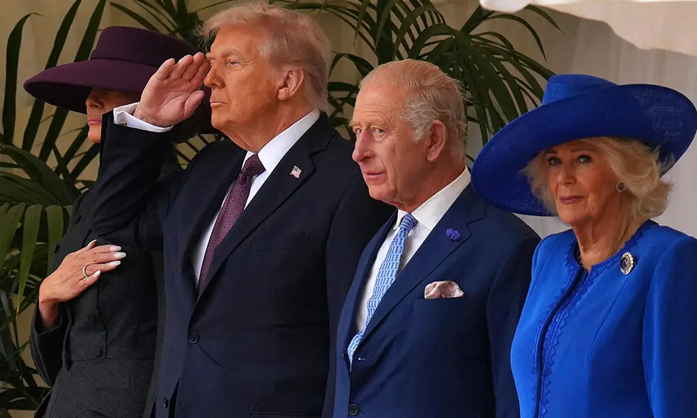 (L-R) US First Lady Melania Trump, US President Donald Trump, Britain&rsquo;s King Charles III and Britain&rsquo;s Queen Camilla stand on the dias during a ceremonial welcome in the Quadrangle at Windsor Castle, in Windsor, on September 17, 2025, during the US president&rsquo;s second State Visit. Photo: AFP