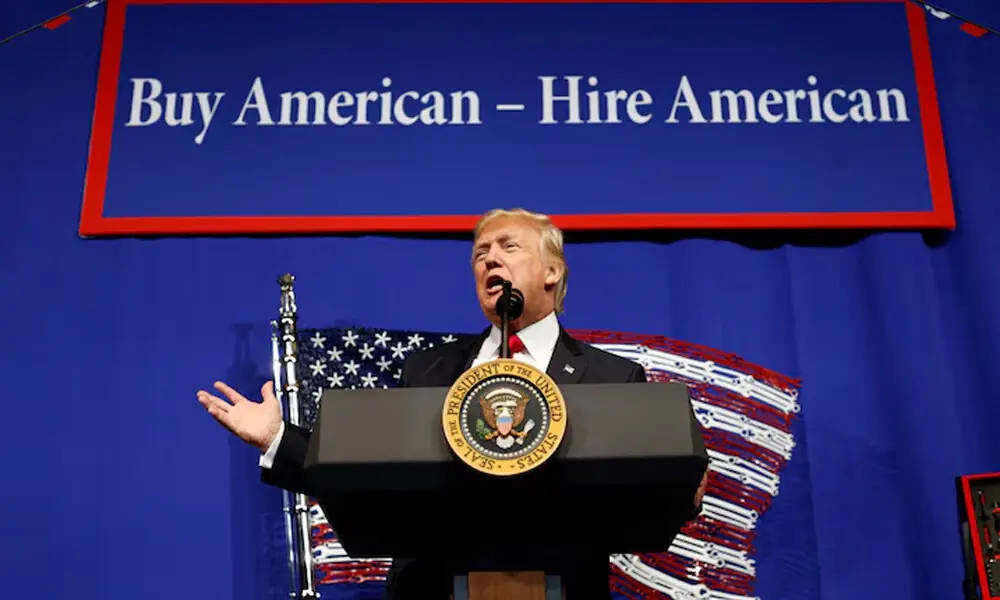 U.S. President Donald Trump speaks before signing an executive order directing federal agencies to recommend changes to a temporary visa program used to bring foreign workers to the United States to fill high-skilled jobs during a visit to the world headquarters of Snap-On Inc, a tool manufacturer in Kenosha, Wisconsin, U.S., April 18, 2017. REUTERS