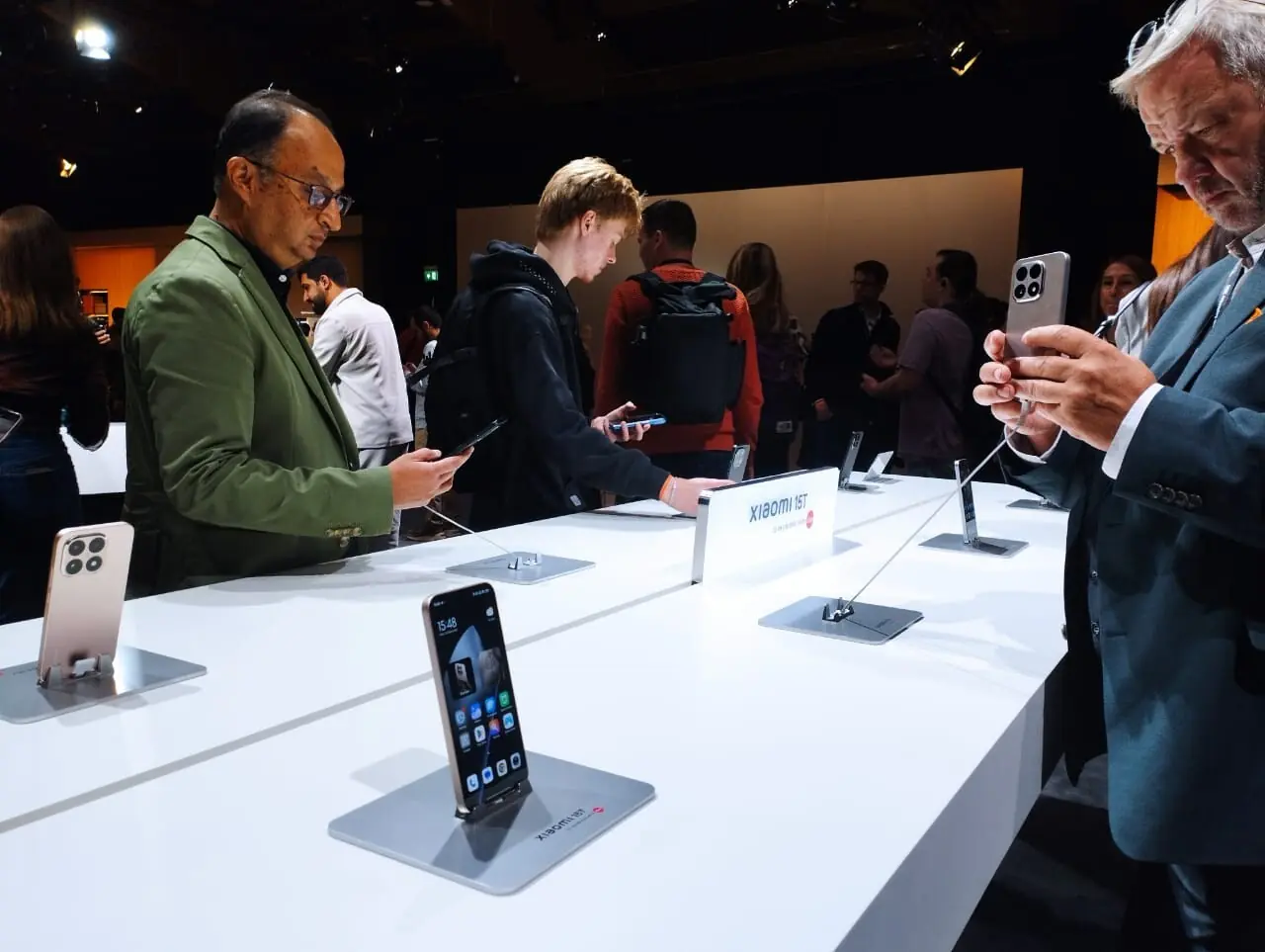  Visitors explore the newly launched Xiaomi 15T smartphones on display at the launch event in Munich on Wednesday, September 24, 2025. Photo: author 