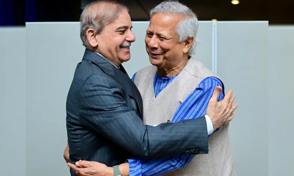 Prime Minister Shehbaz Sharif (left) embraces Chief Adviser of Bangladesh Professor Muhammad Yunus. Photo: PMO