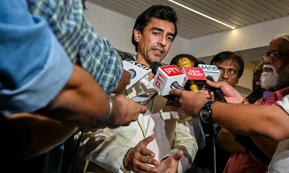 Mithun Manhas, newly elected President of the Board of Control for Cricket in India (BCCI), speaks with media after attending the Annual General Meeting (AGM) at their headquarters in Mumbai on September 28, 2025. Photo: AFP