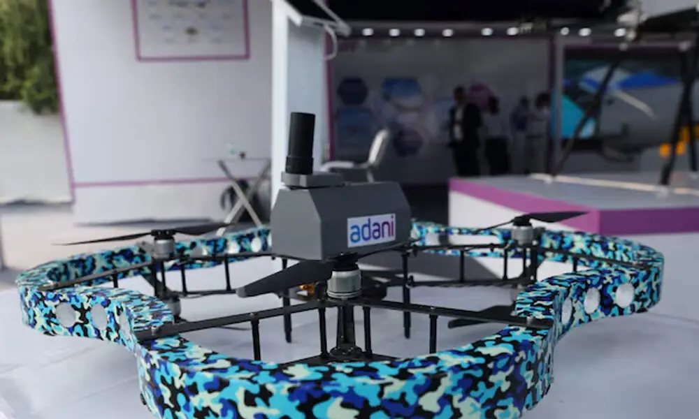 A view shows an Unmanned Aerial Vehicle (UAV) called Partha which is a drone solution for methane gas leakage detection by Adani Defence and Aerospace, at their stall during the drone exhibition at Bharat Drone Shakti 2023 organised by Indian Air Force(IAF) and Drone Federation of India(DFI) at the Hindon Airbase in Ghaziabad, India, September 25, 2023. REUTERS A view shows an Unmanned Aerial Vehicle (UAV) called Partha which is a drone solution for methane gas leakage detection by Adani Defence and Aerospace, at their stall during the drone exhibition at Bharat Drone Shakti 2023 organised by Indian Air Force(IAF) and Drone Federation of India(DFI) at the Hindon Airbase in Ghaziabad, India, September 25, 2023. REUTERS