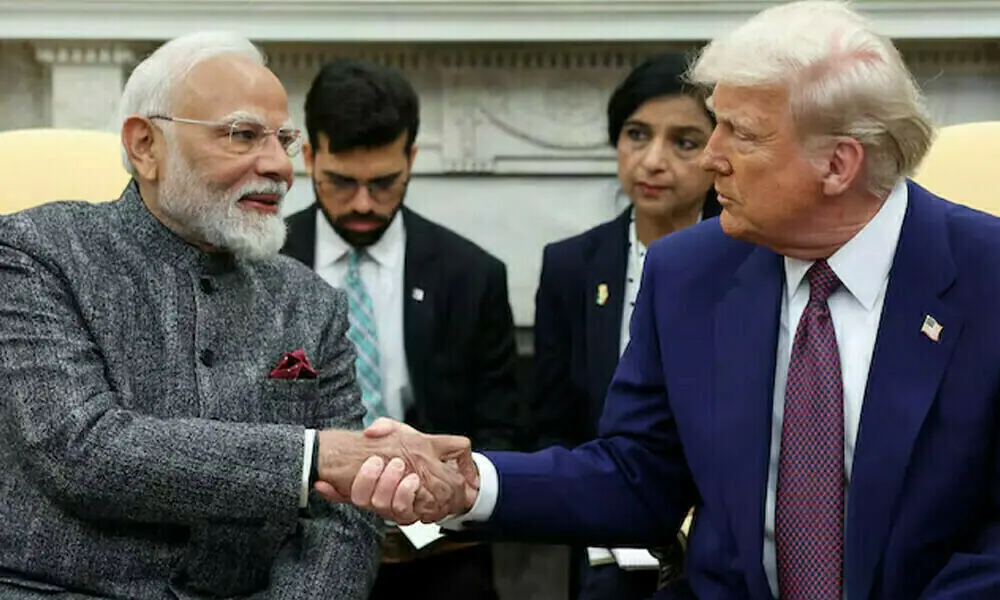 U.S. President Donald Trump and Indian Prime Minister Narendra Modi shake hands, at the White House in Washington, D.C., U.S., February 13, 2025. File Photo: Reuters