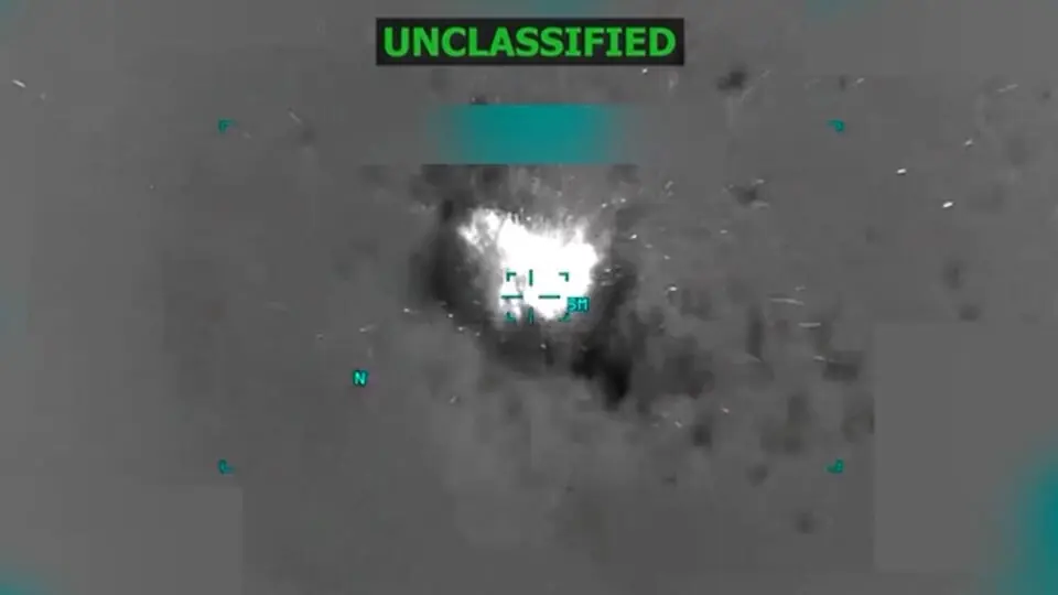 A boat burns off the coast of Venezuela in this screen grab taken from a video released October 14, 2025, depicting what U.S. President Donald Trump said on a post on Truth Social was a US strike on a suspected drug-trafficking boat. Donald Trump via Truth Social. Photo: Reuters