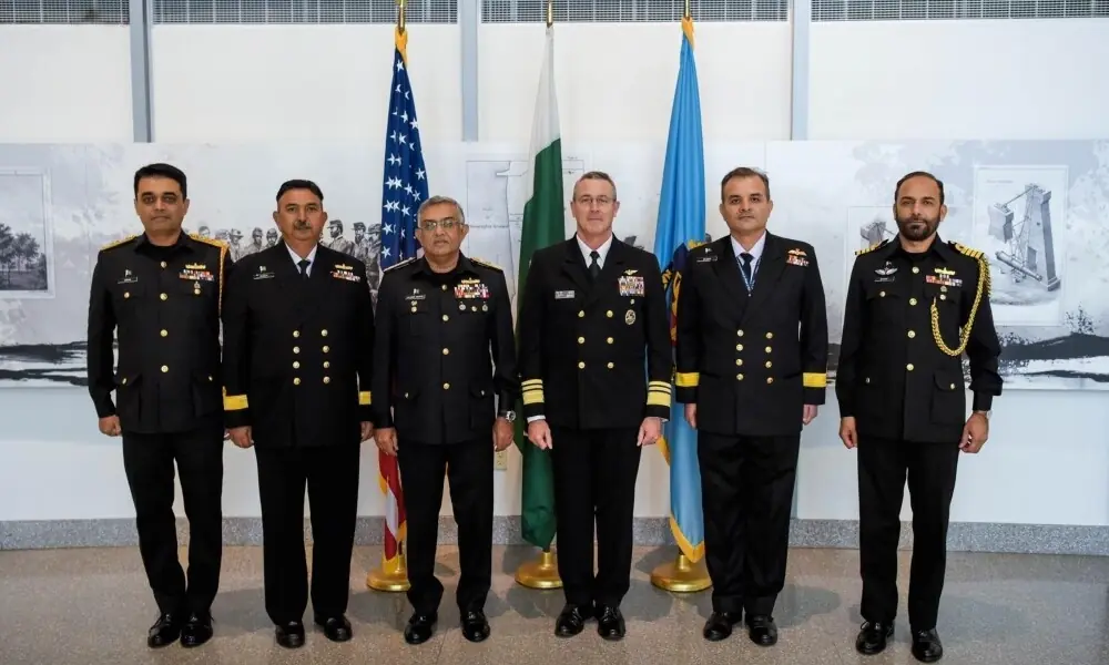 Chief of the Naval Staff Admiral Naveed Ashraf in a group photo with President of National Defence University Vice Admiral Peter A. Gravin during his visit to United States of America. Photo: Facebook/@DgprNavy