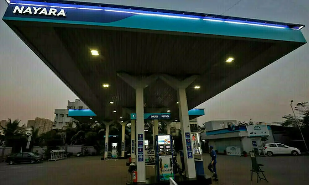 A worker stands at a fuel station of Nayara Energy on the outskirts of Ahmedabad, India, November 16, 2022. File Photo: Reuters