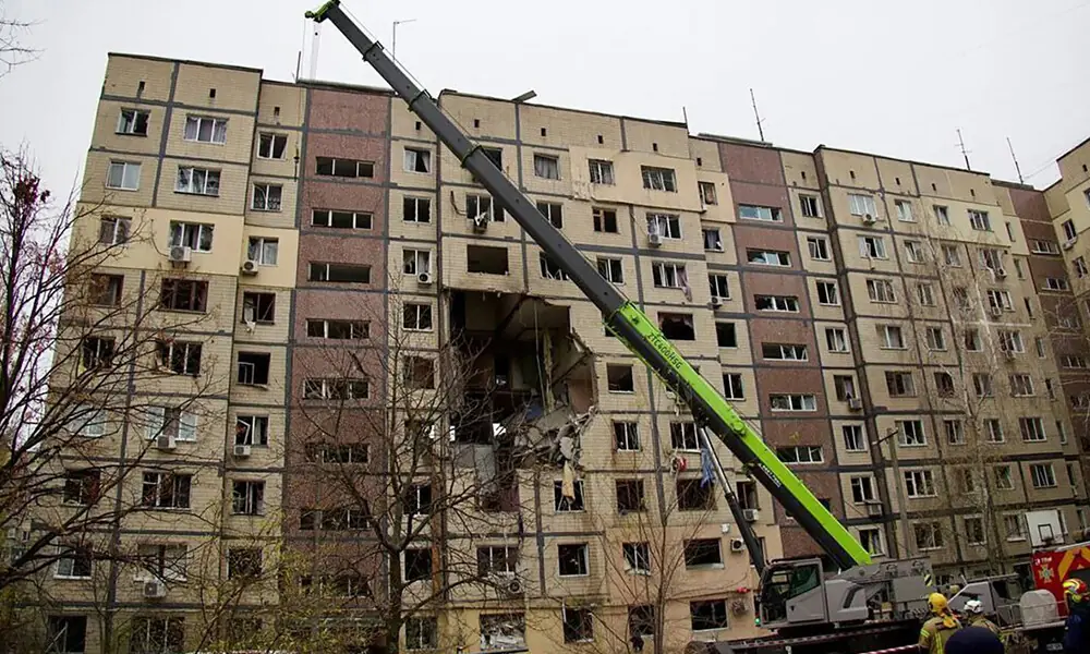 In this handout photograph taken and released by the Dnipropetrovsk Regional Military Administration on November 8, 2025, Ukrainian rescuers work at the site of a heavily damaged residential building following an air attack in Dnipro, amid the Russian invasion of Ukraine. Photo: AFP