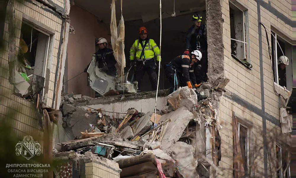 In this handout photograph taken and released by the Dnipropetrovsk Regional Military Administration on November 8, 2025, Ukrainian rescuers work at the site of a heavily damaged residential building following an air attack in Dnipro, amid the Russian invasion of Ukraine. Photo: AFP