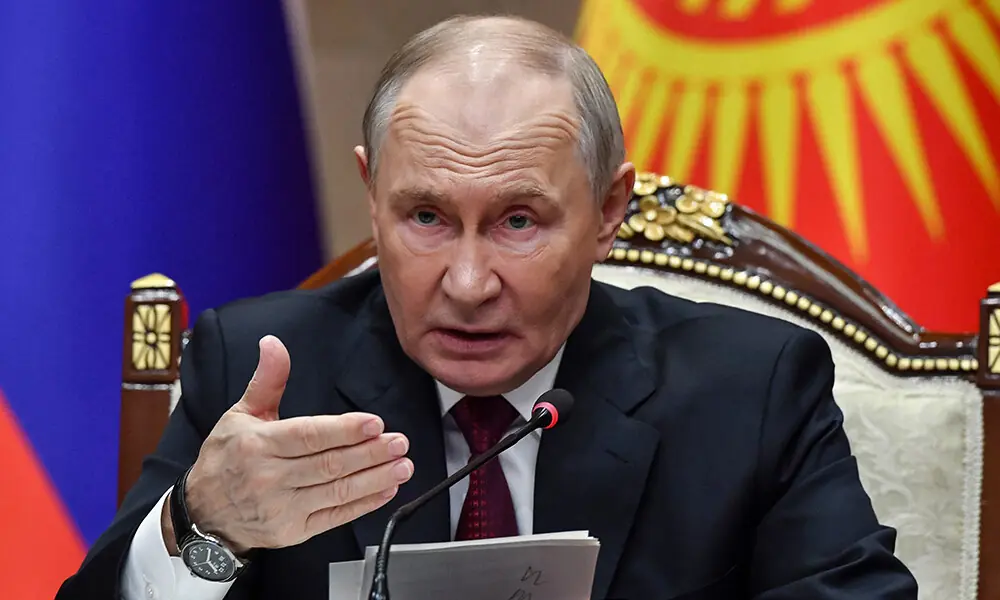 Russian President Vladimir Putin attends a joint media statement with Kyrgyz President following their talks at the Yntymak Ordo (Palace of Unity) presidential residence in Bishkek on November 26, 2025. Photo: AFP