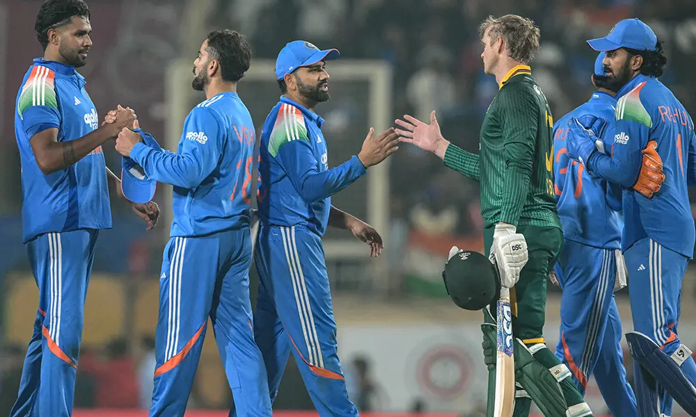 South Africa&rsquo;s Corbin Bosch (2R) shakes hands with India&rsquo;s Rohit Sharma (C) at the end of the first one-day international (ODI) cricket match between India and South Africa at the JSCA International Stadium in Ranchi on November 30, 2025. Photo: AFP