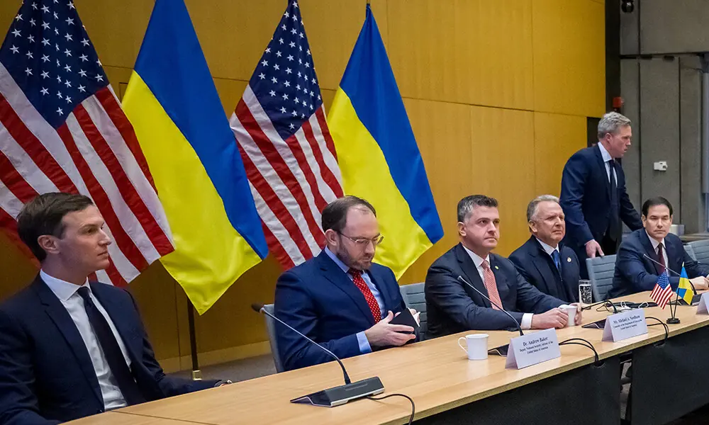 US Secretary of State Marco Rubio (5th L), US special envoy Steve Witkoff (4th L), US Secretary of the Army Daniel Driscoll (taking his seat) and US President Donald Trump&rsquo;s son-in-law Jared Kushner (L) face the Ukrainian delegation during discussions on a US plan to end the war in Ukraine at the US Mission in Geneva, on November 23, 2025. File Photo: AFP