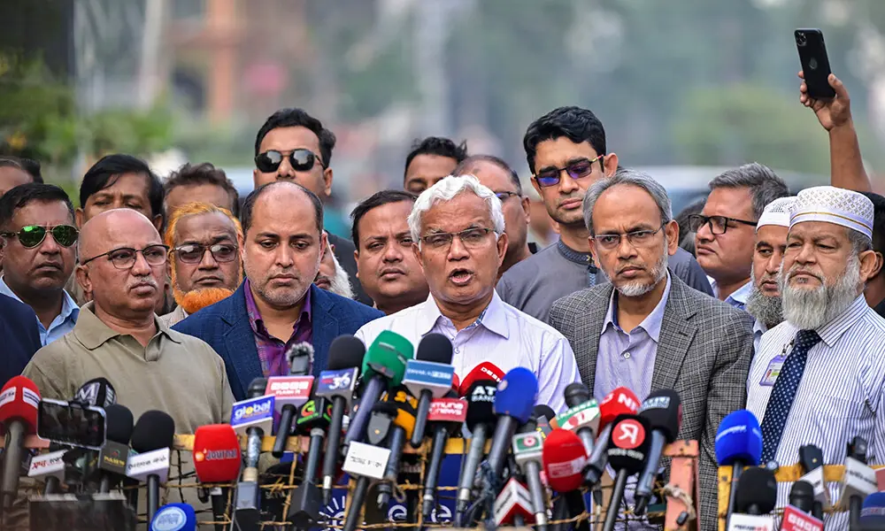 AZM Zahid Hossain (C), personal doctor of Bangladesh&rsquo;s ex-prime minister Khaleda Zia, speaks with media outside a hospital in Dhaka on December 4, 2025. Photo: AFP
