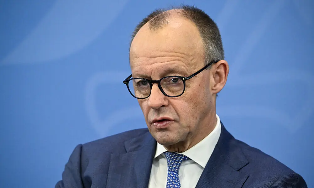 German Chancellor Friedrich Merz attends a press briefing on the results of their overnight coalition committee consultations, on December 11, 2025 at the Chancellery in Berlin. Photo: AFP