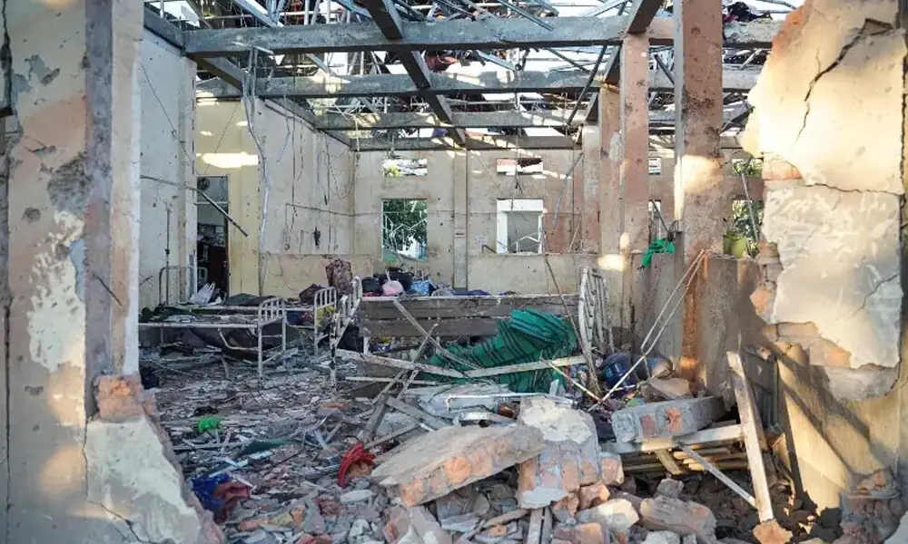 This picture shows a hospital damaged in a Myanmar military air strike that killed more than 30 people at a hospital in Mrauk U, western Rakhine state on December 11, 2025. &mdash;AFP