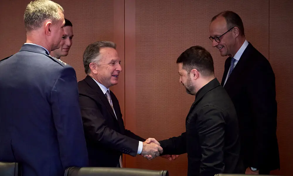 In this handout photograph taken and released by the Ukrainian Presidential Press Service on December 14, 2025, Germany’s Chancellor Friedrich Merz (R) and US President Donald Trump’s son-in-law Jared Kushner (2nd L) react as US special envoy Steve Witkoff (C) and Ukraine’s President Volodymyr Zelensky (2nd R) greet each other prior to a meeting in a conference room at the Chancellery in Berlin, amid the Russian invasion of Ukraine. Photo: AFP In this handout photograph taken and released by the Ukrainian Presidential Press Service on December 14, 2025, Germany’s Chancellor Friedrich Merz (R) and US President Donald Trump’s son-in-law Jared Kushner (2nd L) react as US special envoy Steve Witkoff (C) and Ukraine’s President Volodymyr Zelensky (2nd R) greet each other prior to a meeting in a conference room at the Chancellery in Berlin, amid the Russian invasion of Ukraine. Photo: AFP