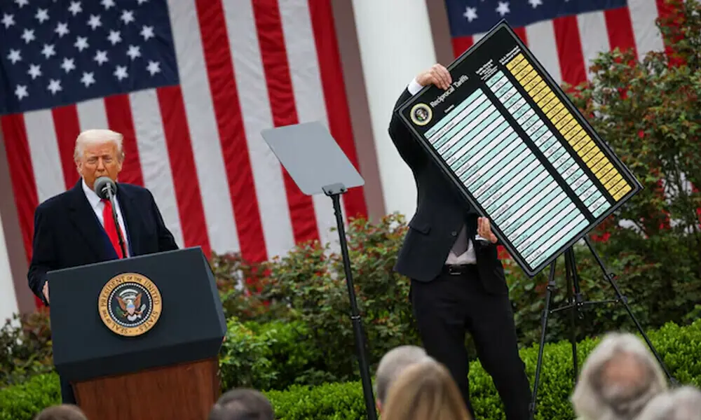 US Secretary of Commerce Howard Lutnick holds a chart as US President Donald Trump delivers remarks on tariffs in the Rose Garden at the White House in Washington, DC, US, April 2, 2025. File Photo: Reuters
