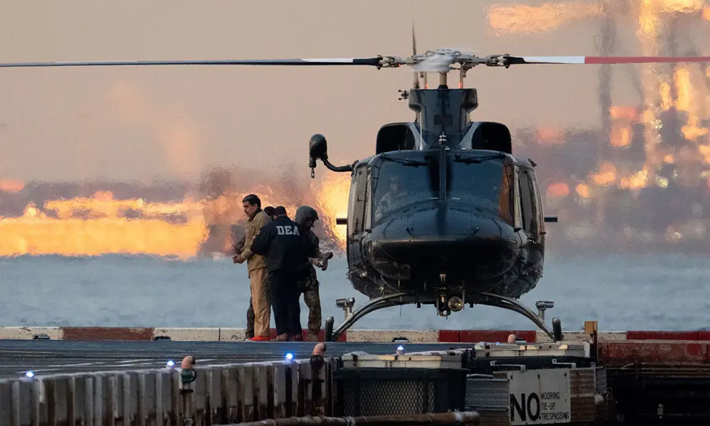 Captured Venezuelan President Nicolas Maduro is escorted, as he heads towards the Daniel Patrick Manhattan United States Courthouse for an initial appearance to face U.S. federal charges including narco-terrorism, conspiracy, drug trafficking, money laundering and others at Downtown Manhattan Heliport, in New York City, U.S., January 5, 2026. Photo: Reuters