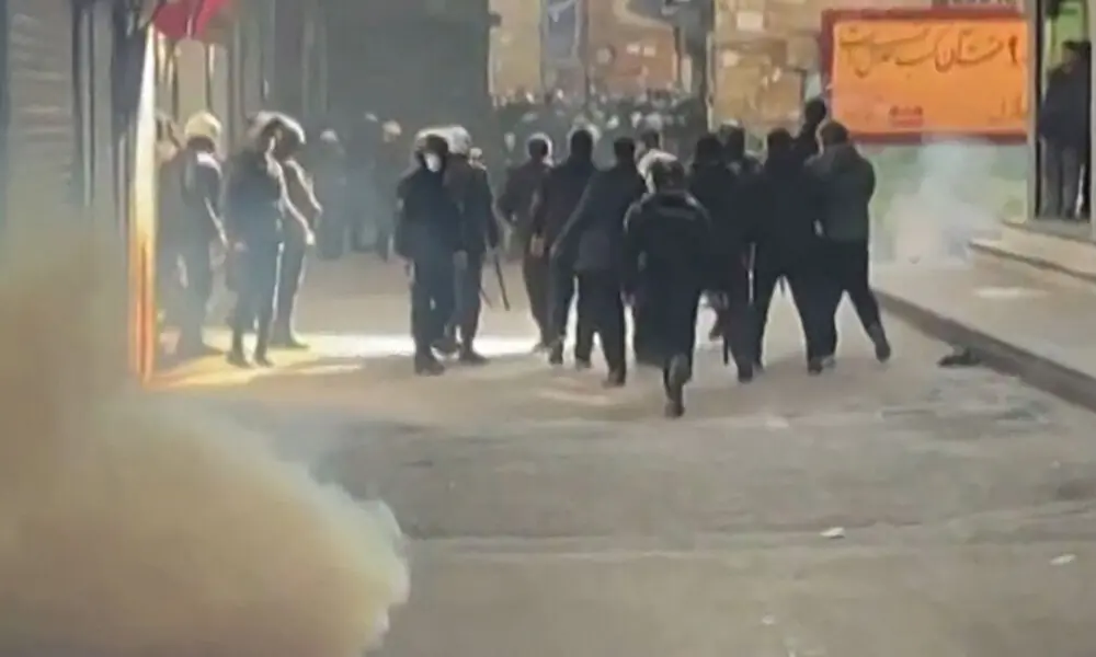 This grab taken on January 6, 2026, from UGC images posted on social media the same day shows Iranian security forces using tear gas to disperse protesters at the Tehran bazaar. Photo: AFP This grab taken on January 6, 2026, from UGC images posted on social media the same day shows Iranian security forces using tear gas to disperse protesters at the Tehran bazaar. Photo: AFP