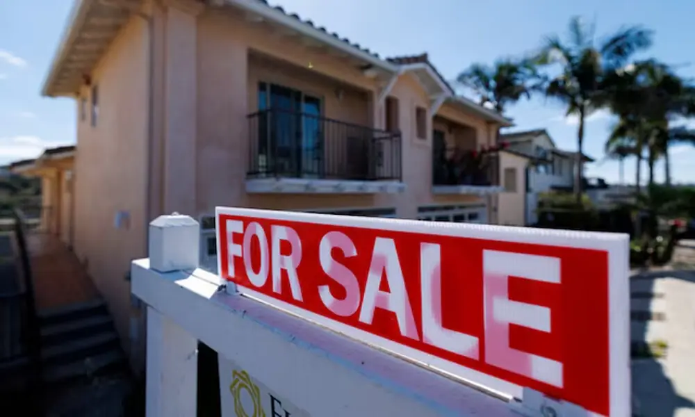 A for sale sign is shown for a residential home in Encinitas, California, U.S. Reuters