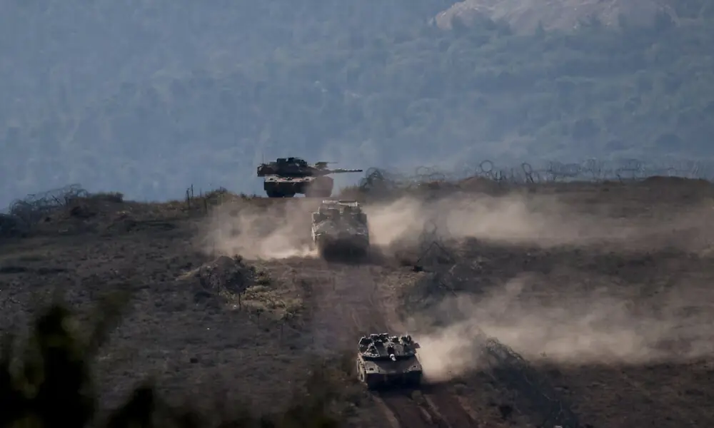 Lebanese army members stand on a military vehicle during a Lebanese army media tour, to review the army&rsquo;s operations in the southern Litani sector, in Alma Al-Shaab, near the border with Israel, southern Lebanon, November 28, 2025. REUTERS