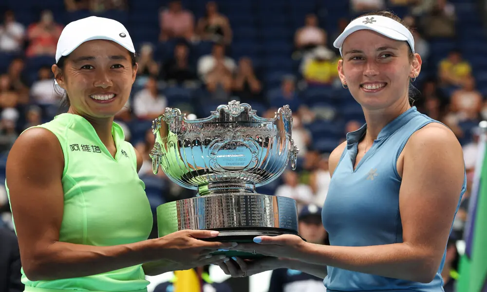 China&rsquo;s Zhang Shuai (L) and partner Belgium&rsquo;s Elise Mertens pose with the winners&rsquo; trophy after their victory in their women&rsquo;s doubles final match of the Australian Open tennis tournament in Melbourne on January 31, 2026. Photo: AFP