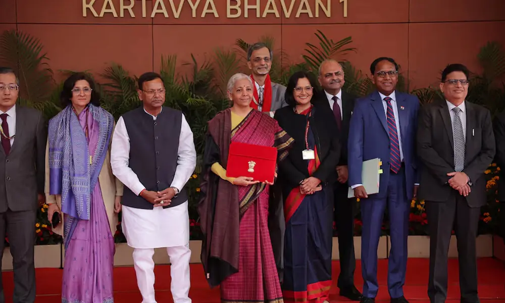 India&rsquo;s Finance Minister Nirmala Sitharaman holds a folder bearing the Government of India&rsquo;s emblem, as she poses with her officials while leaving her office to present the annual federal budget in parliament, in New Delhi, India, February 1, 2026. Photo: Reuters