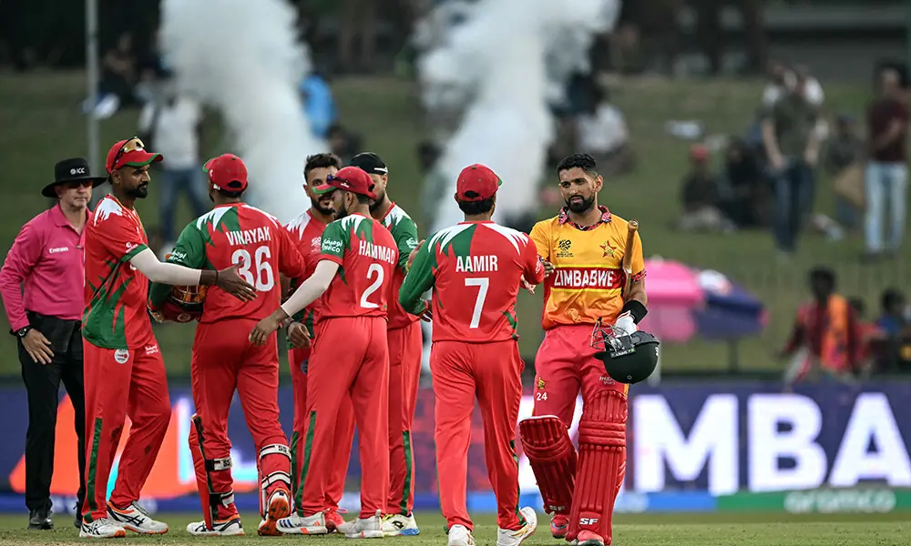 Zimbabwe&rsquo;s captain Sikandar Raza (R) shakes hands with Oman&rsquo;s players at the end of the 2026 ICC Men&rsquo;s T20 Cricket World Cup group stage match between Zimbabwe and Oman at the Sinhalese Sports Club Ground in Colombo on February 9, 2026. Photo: AFP