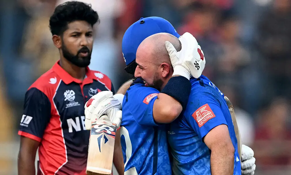 Italy&rsquo;s Anthony Mosca and Justin Mosca celebrate after winning in the end of the 2026 ICC Men&rsquo;s T20 Cricket World Cup group stage match against Nepal at the Wankhede Stadium in Mumbai on February 12, 2026. Photo: AFP