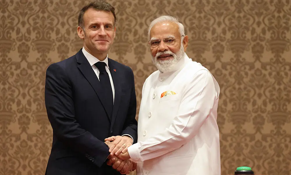 France&rsquo;s President Emmanuel Macron (L) and India&rsquo;s Prime Minister Narendra Modi shake hands at a press event to deliver joint declarations in Mumbai on February 17, 2026. Photo: AFP