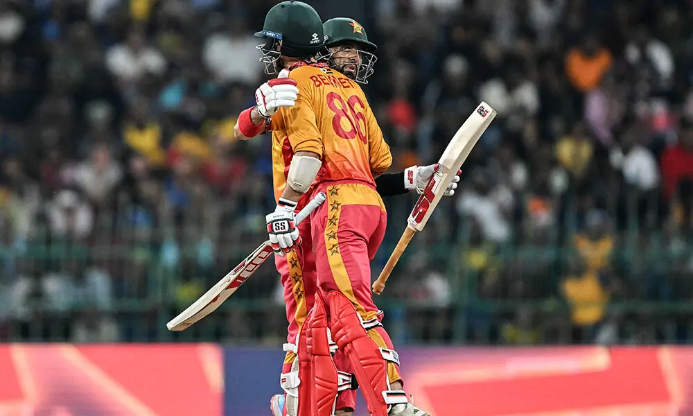 Zimbabwe&rsquo;s Brian Bennett (front) celebrates with his captain Sikandar Raza after scoring a half-century (50 runs) during the 2026 ICC Men&rsquo;s T20 Cricket World Cup group stage match between Sri Lanka and Zimbabwe at the R Premadasa Stadium in Colombo on February 19, 2026. Photo: AFP