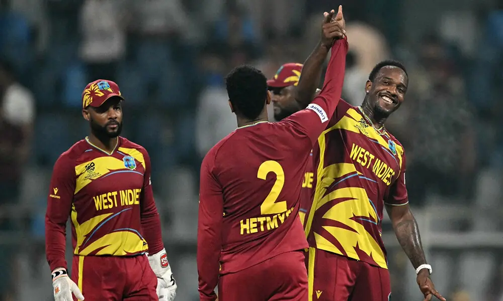 West Indies&rsquo; captain Shai Hope (L), Shimron Hetmyer (C) and Matthew Forde (R) celebrate their team&rsquo;s win at the end of the 2026 ICC Men&rsquo;s T20 Cricket World Cup Super Eights match between West Indies and Zimbabwe at the Wankhede Stadium in Mumbai on February 23, 2026. Photo: AFP