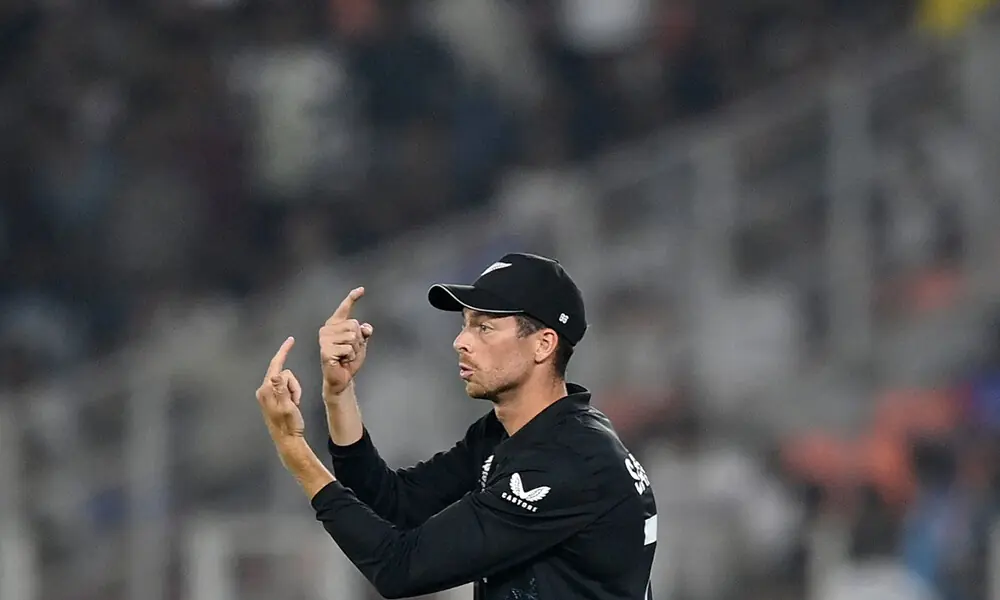 New Zealand&rsquo;s captain Mitchell Santner adjusts field placements during the 2026 ICC Men&rsquo;s T20 Cricket World Cup group stage match between New Zealand and South Africa at the Narendra Modi Stadium in Ahmedabad on February 14, 2026. Photo: AFP