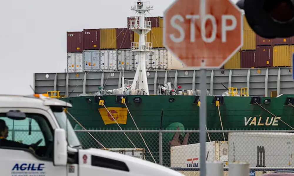A view of cargo ship with shipping containers at the port of Oakland following the Supreme Court&rsquo;s ruling that Trump had exceeded his authority when he imposed tariffs, in Oakland, California, U.S., February 23, 2026. Photo: Reuters