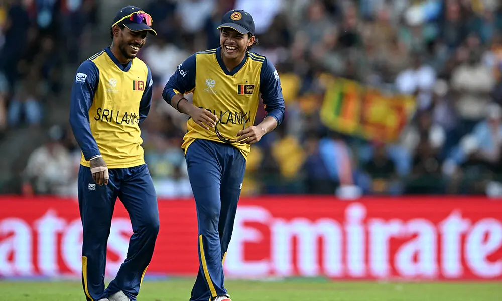 Sri Lanka&rsquo;s Dunith Wellalage (R) celebrates with Pathum Nissanka after taking a catch to dismiss England&rsquo;s Will Jacks during the 2026 ICC Men&rsquo;s T20 Cricket World Cup Super Eights match between Sri Lanka and England at Pallekele International Cricket Stadium in Kandy on February 22, 2026. Photo: AFP