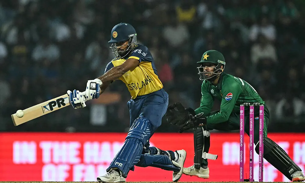 Sri Lanka&rsquo;s Pavan Rathnayake (L) plays a shot as Pakistan&rsquo;s wicketkeeper Usman Khan fields during the 2026 ICC Men&rsquo;s T20 Cricket World Cup Super Eights match between Sri Lanka and Pakistan at the Pallekele International Cricket Stadium in Kandy on February 28, 2026. Photo: AFP