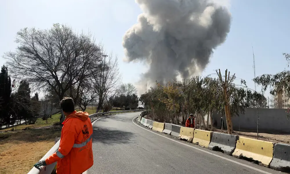 Smoke rises following an explosion, amid the U.S.-Israeli conflict with Iran, in Tehran, Iran. Reuters