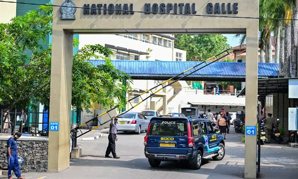 A police vehicle carrying Sri Lanka&rsquo;s Scene of Crime Officers (SOCO) enters the Karapitiya hospital, where the rescued Iranian sailors are being treated, in Galle on March 5, 2026. Photo: AFP