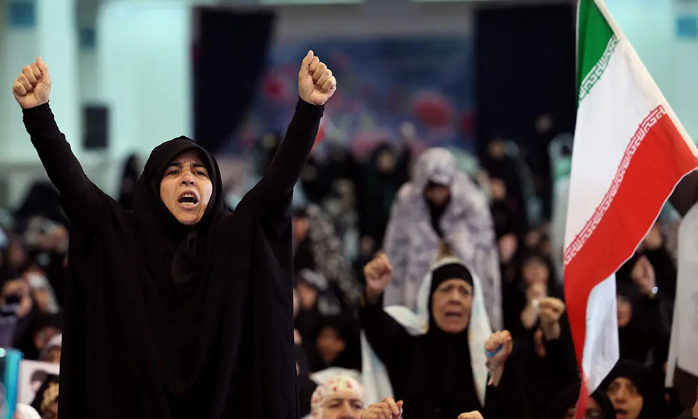 Iranian women shout slogans during Eid al-Fitr prayers, marking the end of the Muslim holy month of Ramadan, at the Grand Mosalla mosque in Tehran on March 21, 2026. Photo: AFP