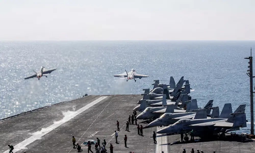 Two F/A-18 Super Hornets launch from the flight deck of the US Navy Nimitz-class aircraft carrier USS Abraham Lincoln in support of the Operation Epic Fury attack on Iran from an undisclosed location March 3, 2026. File Photo: Reuters