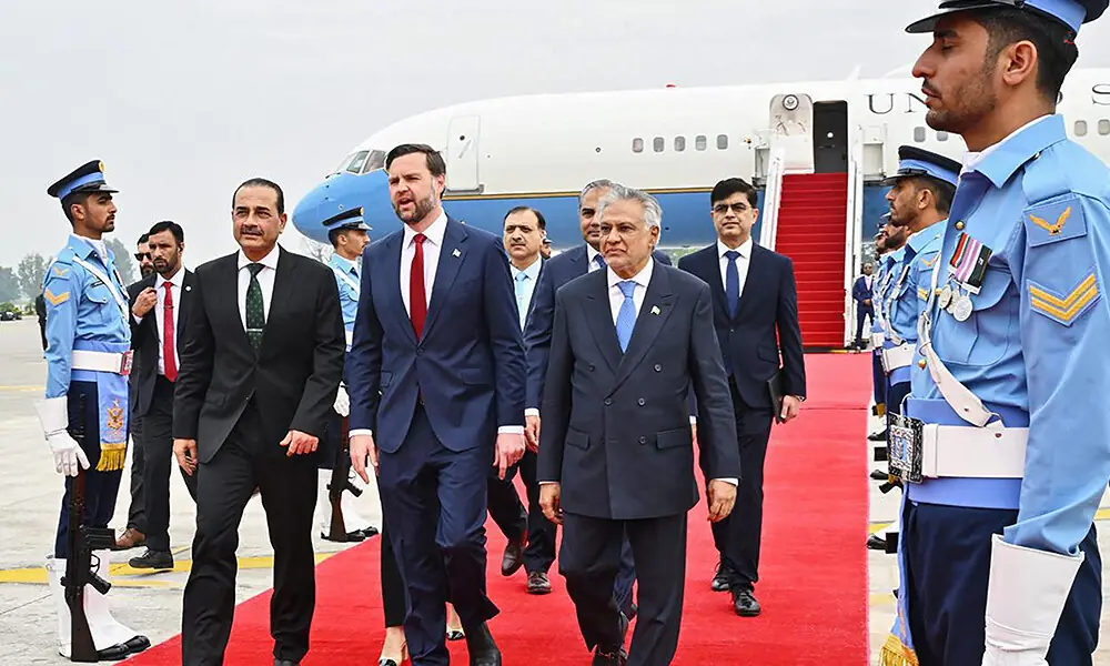 This handout photograph taken and released by Pakistan&rsquo;s Ministry of Foreign Affairs on April 11, 2026 shows US Vice President JD Vance (C) walking with Army Chief and Field Marshal Syed Asim Munir (2L) and Pakistan&rsquo;s Foreign Minister Ishaq Dar (2R) after arriving for the US-Iran peace talks at the Nur Khan military airbase in Islamabad. Photo: AFP
